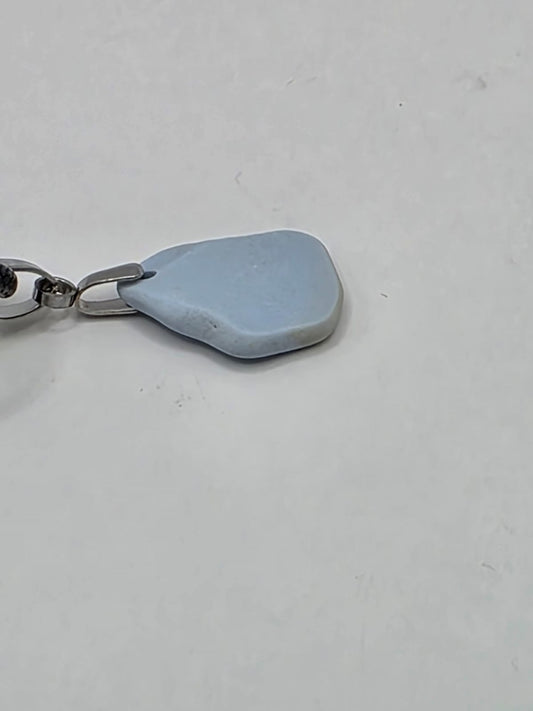 Light blue Sea pottery pendant necklace on a black waxed cord adjustable necklace
