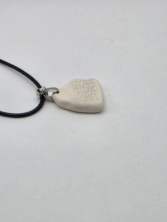 Sea pottery pendant necklace on a black waxed cord adjustable necklace