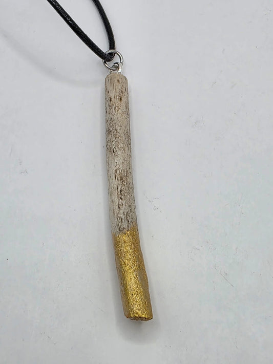 Driftwood pendant necklace featuring metallic painted style design