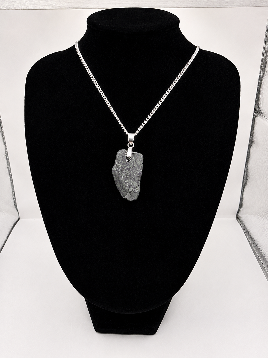 Genuine Black Sea Glass Pendant Necklace on stainless steel chain. Each piece is a one-of-a-kind