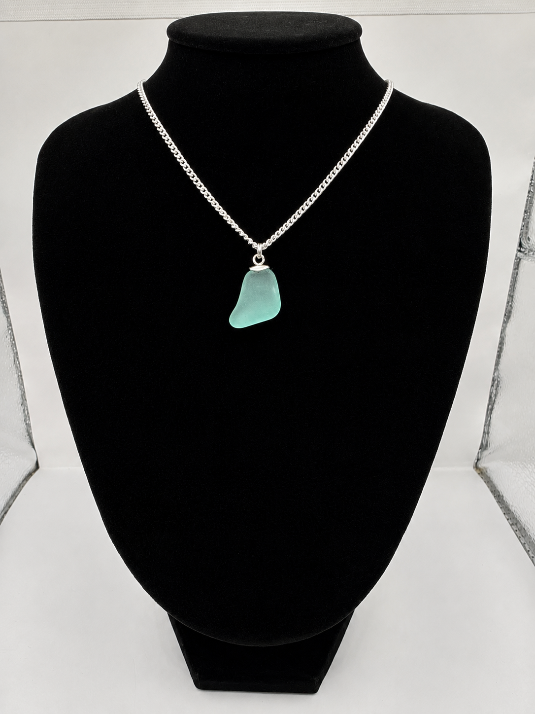 Genuine Aqua Blue Sea Glass Pendant Necklace on stainless steel chain. Each piece is a one-of-a-kind