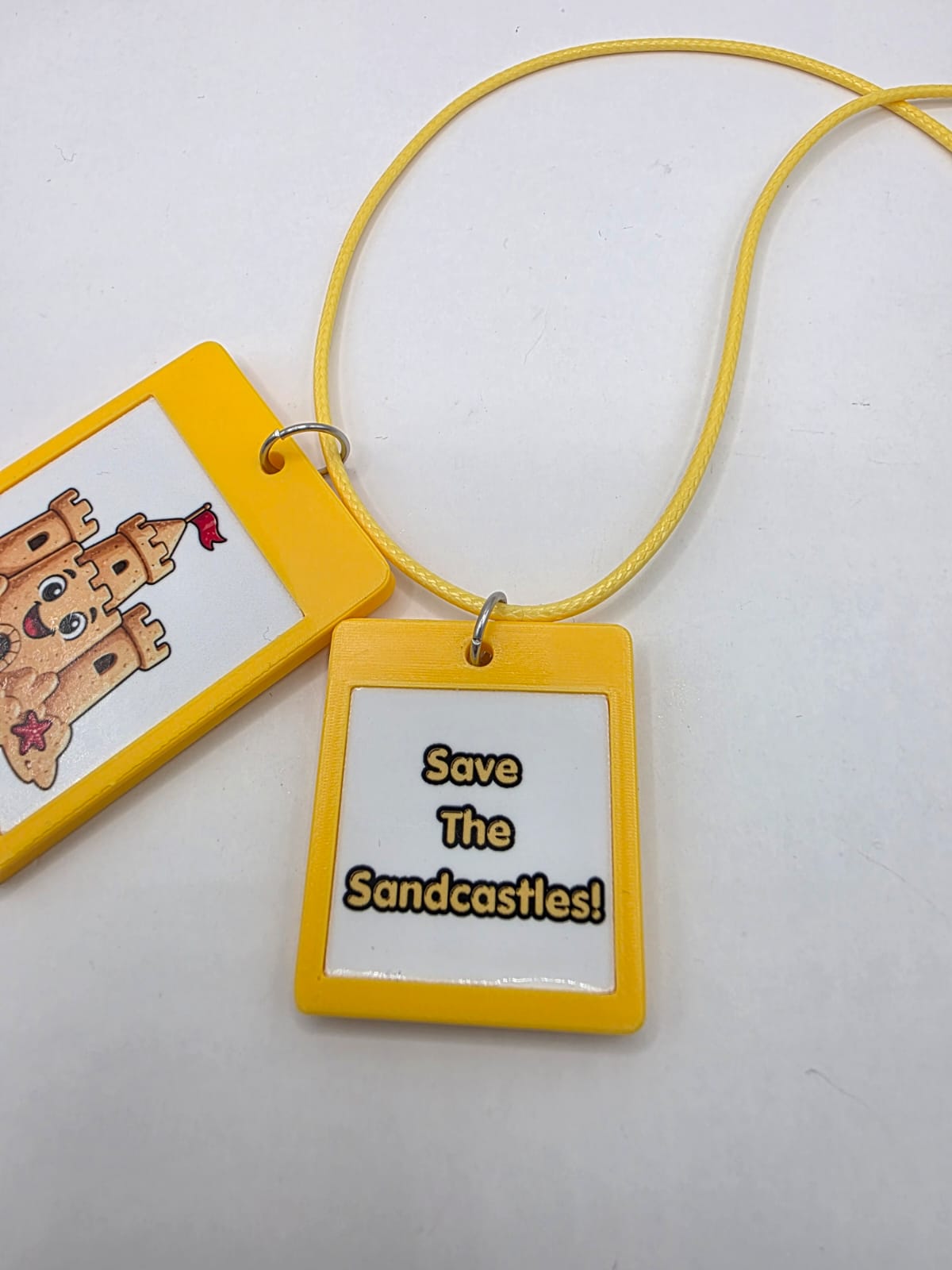 Fun Sandcastle Seaside Theme Lightweight Picture Necklace with Double Pendant. Save the Sandcastles