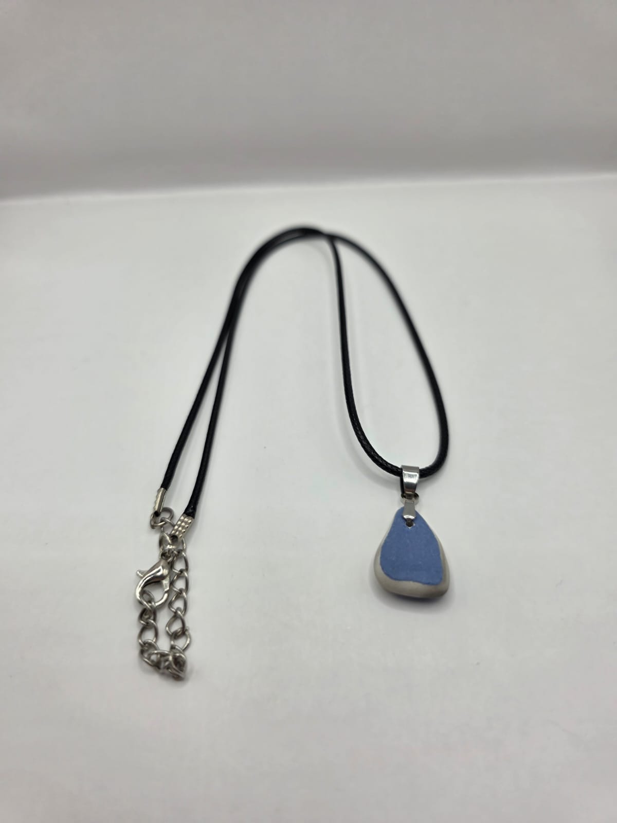Sea pottery pendant necklace on a black waxed cord adjustable necklace