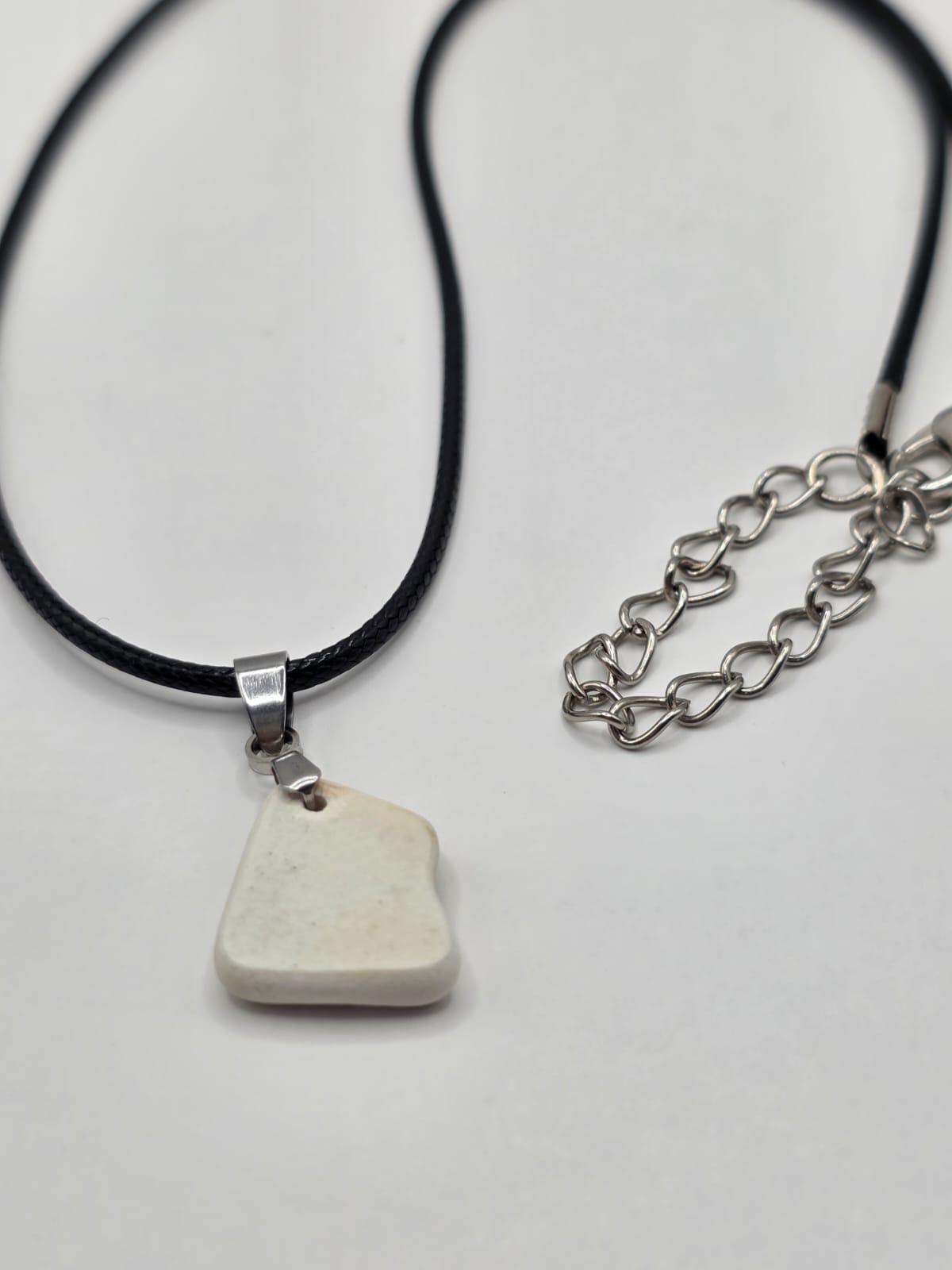 Sea pottery pendant necklace on a black waxed cord adjustable necklace