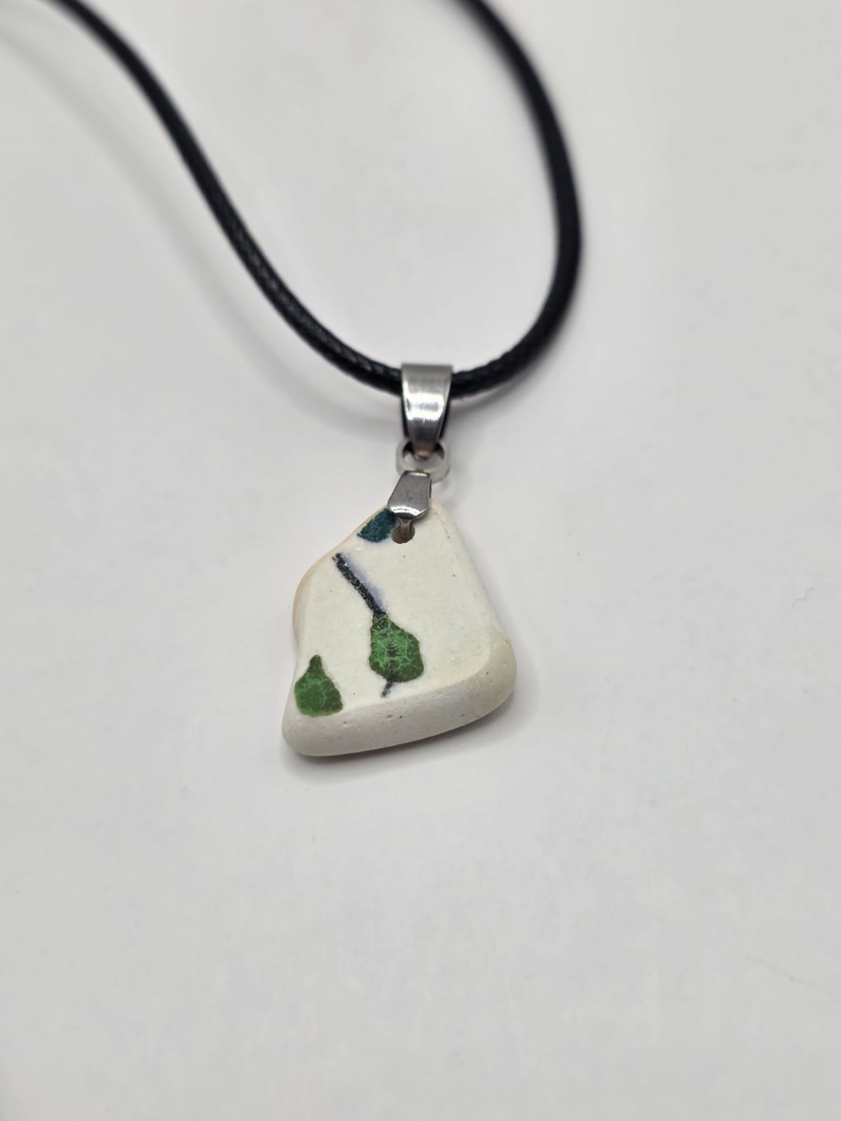 Sea pottery pendant necklace on a black waxed cord adjustable necklace
