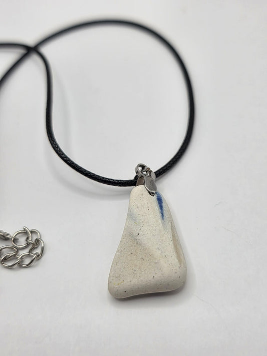 Sea pottery pendant necklace on a black waxed cord adjustable necklace
