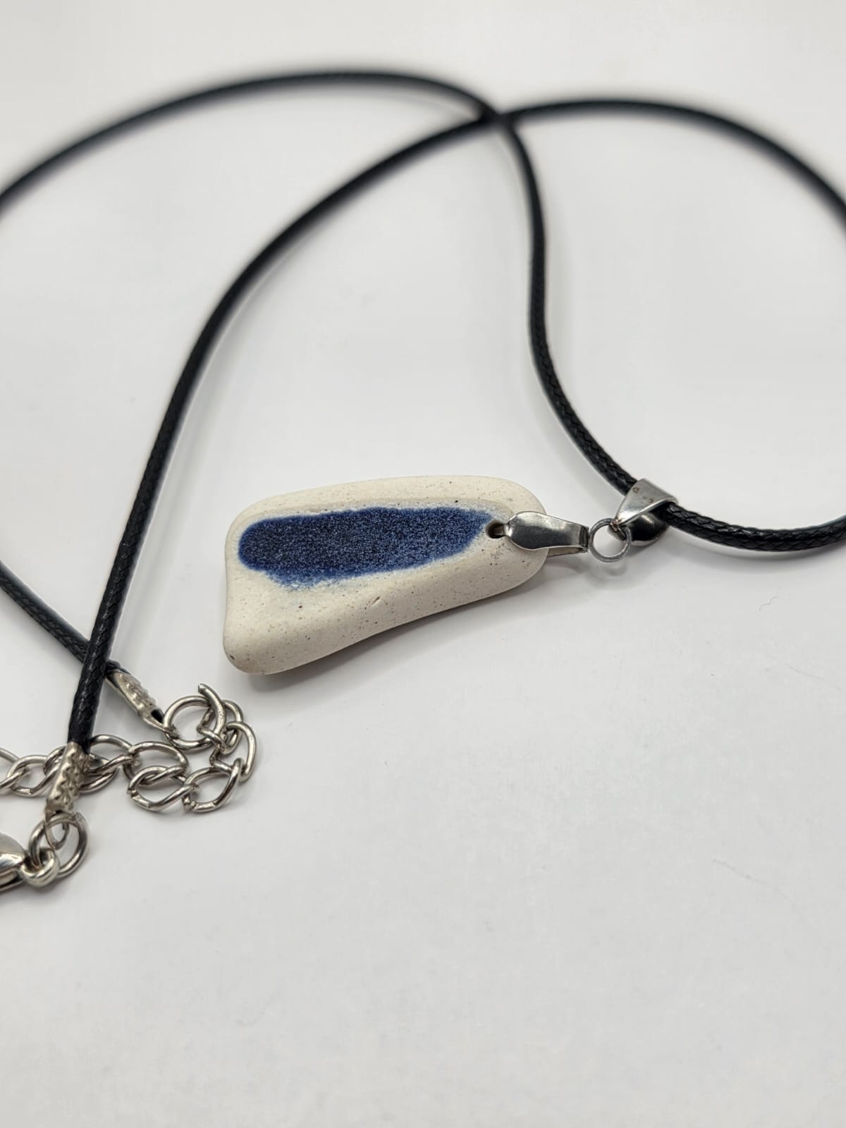 Sea pottery pendant necklace on a black waxed cord adjustable necklace