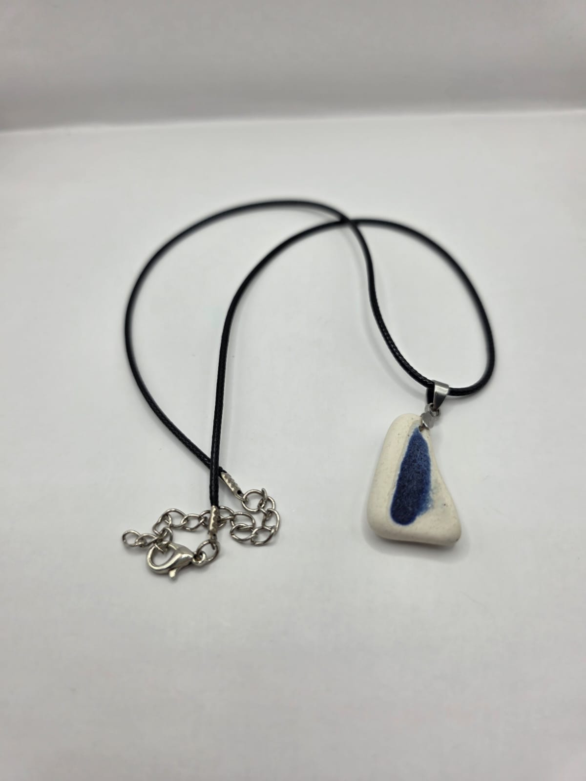 Sea pottery pendant necklace on a black waxed cord adjustable necklace