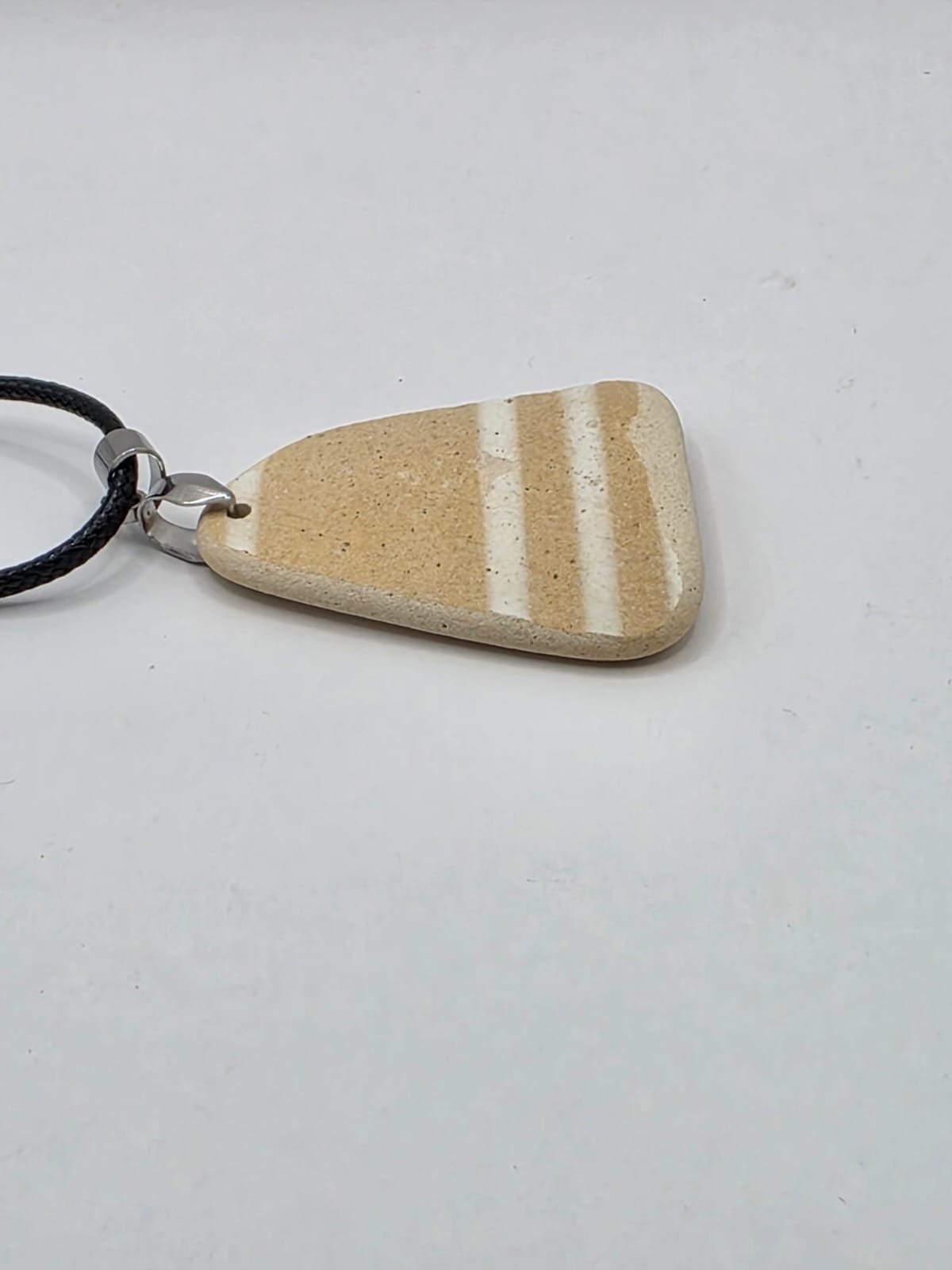 Sea pottery pendant necklace on a black waxed cord adjustable necklace