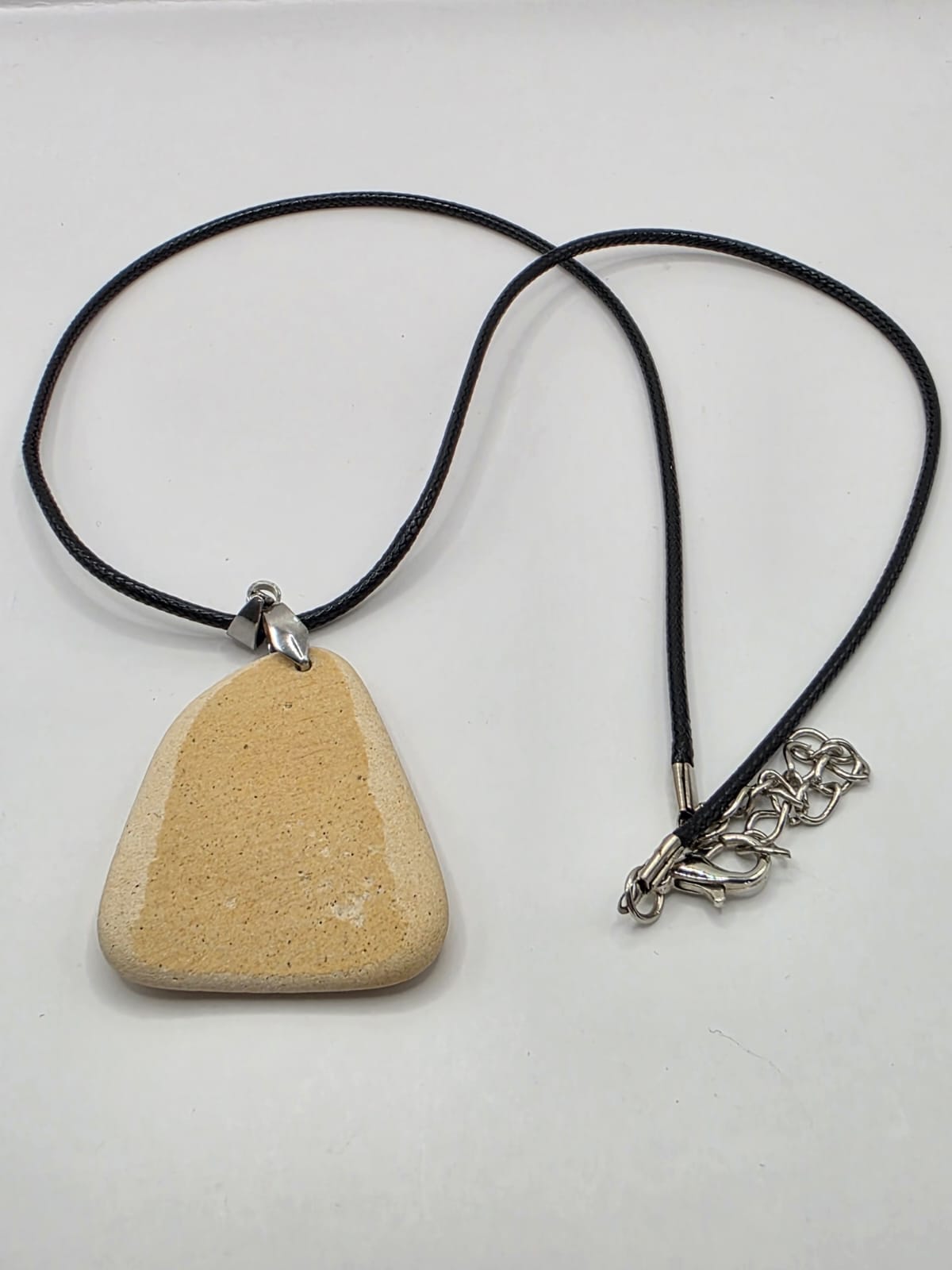 Sea pottery pendant necklace on a black waxed cord adjustable necklace