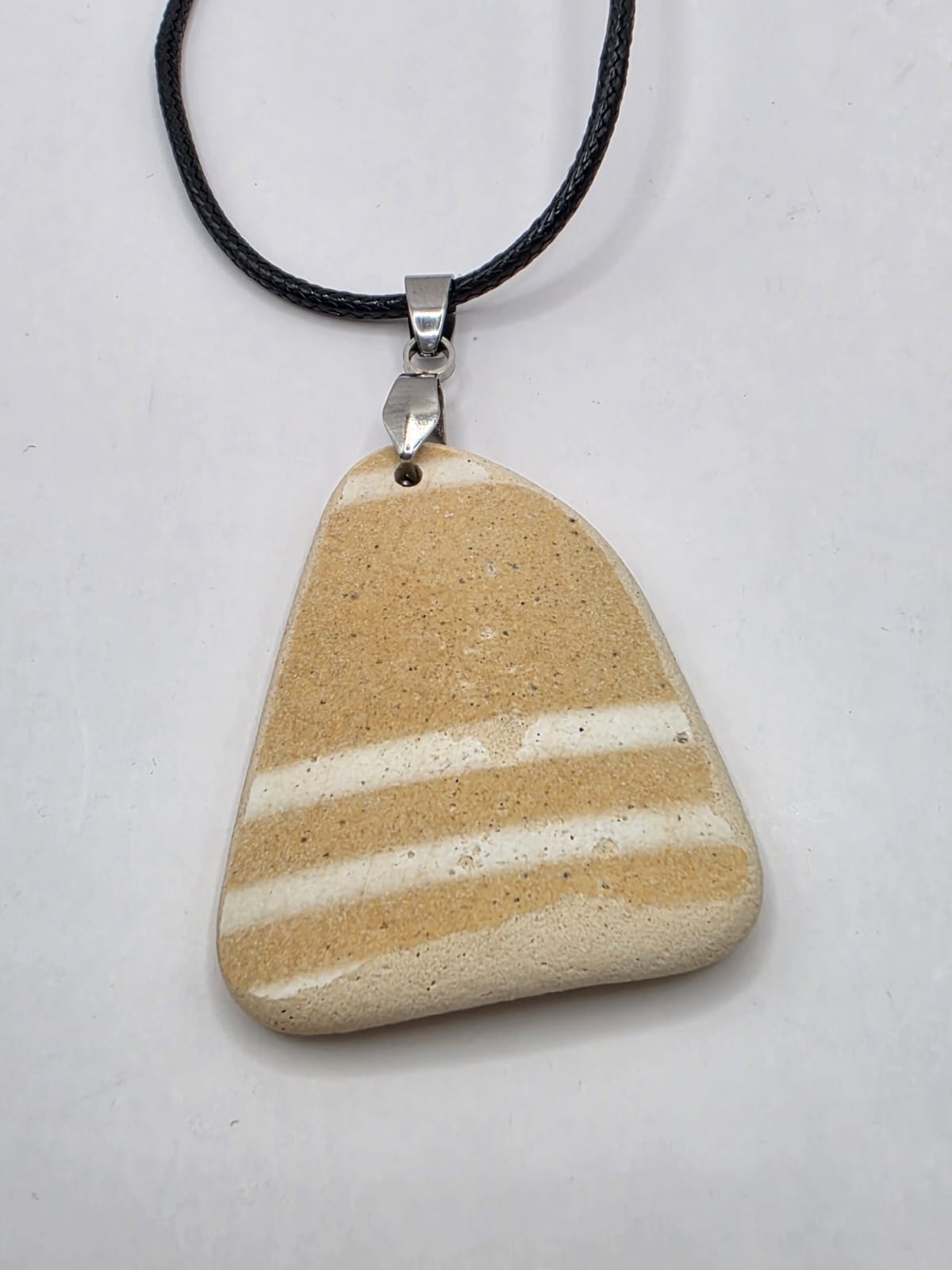 Sea pottery pendant necklace on a black waxed cord adjustable necklace