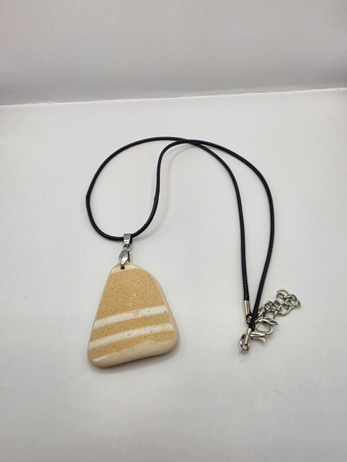 Sea pottery pendant necklace on a black waxed cord adjustable necklace