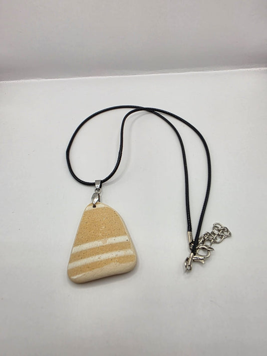 Sea pottery pendant necklace on a black waxed cord adjustable necklace