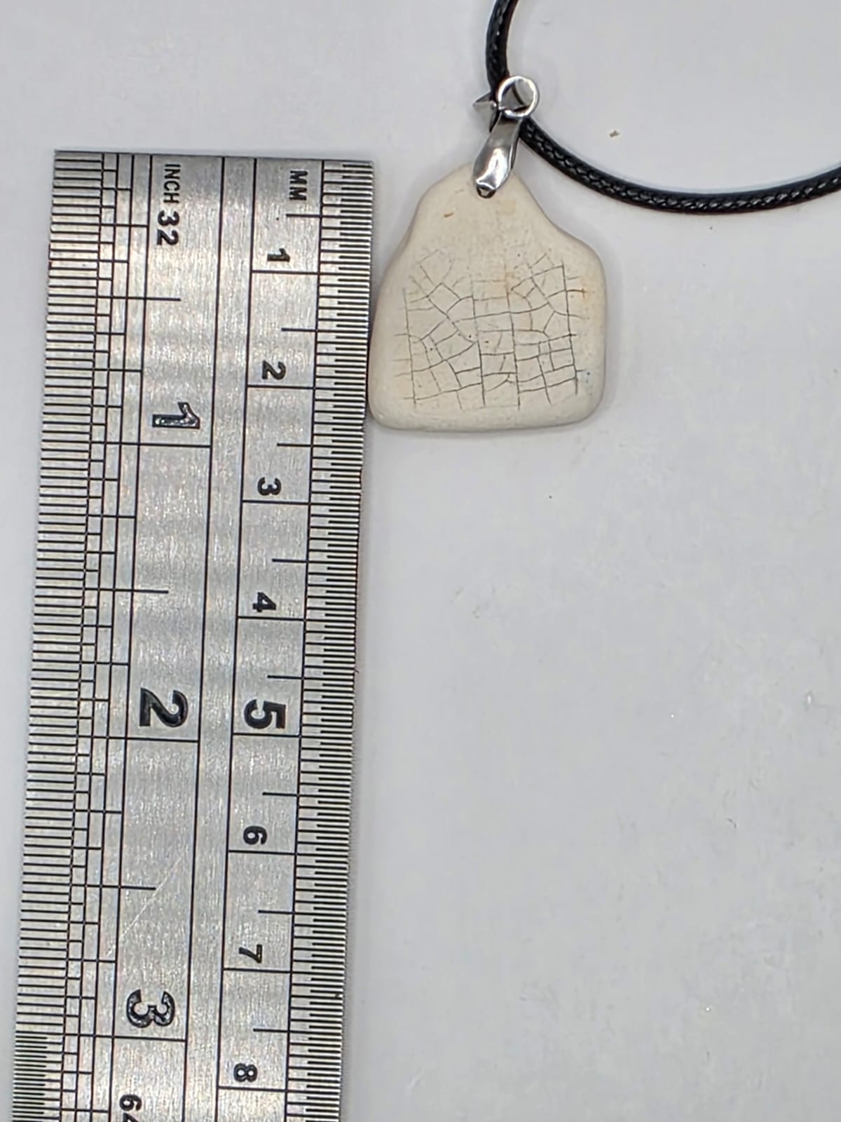 Sea pottery pendant necklace on a black waxed cord adjustable necklace