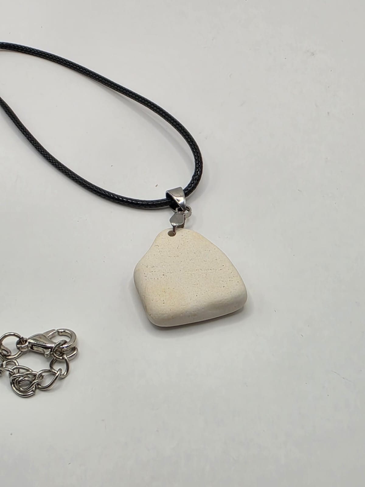 Sea pottery pendant necklace on a black waxed cord adjustable necklace