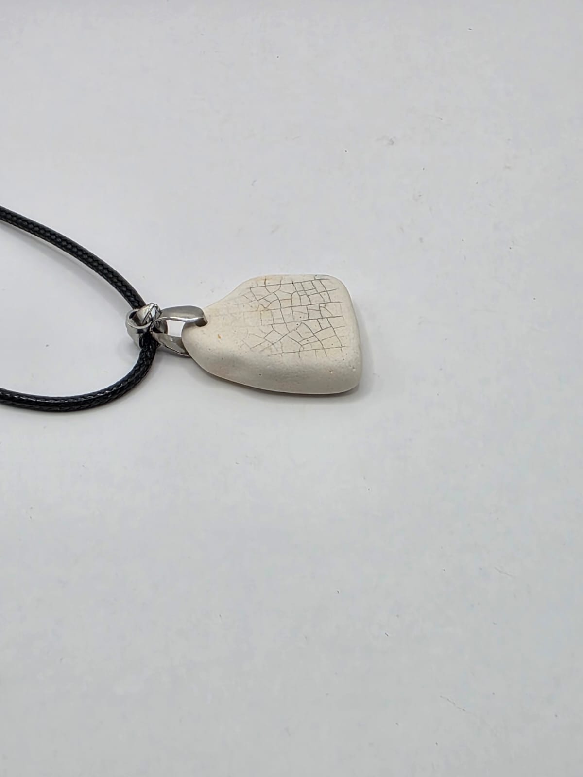 Sea pottery pendant necklace on a black waxed cord adjustable necklace