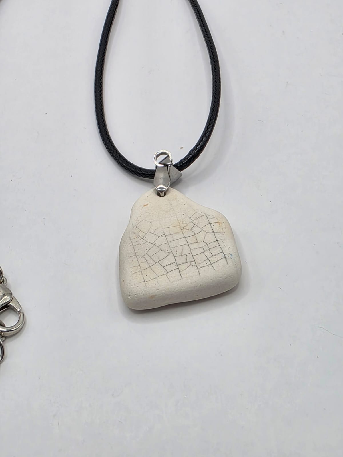 Sea pottery pendant necklace on a black waxed cord adjustable necklace