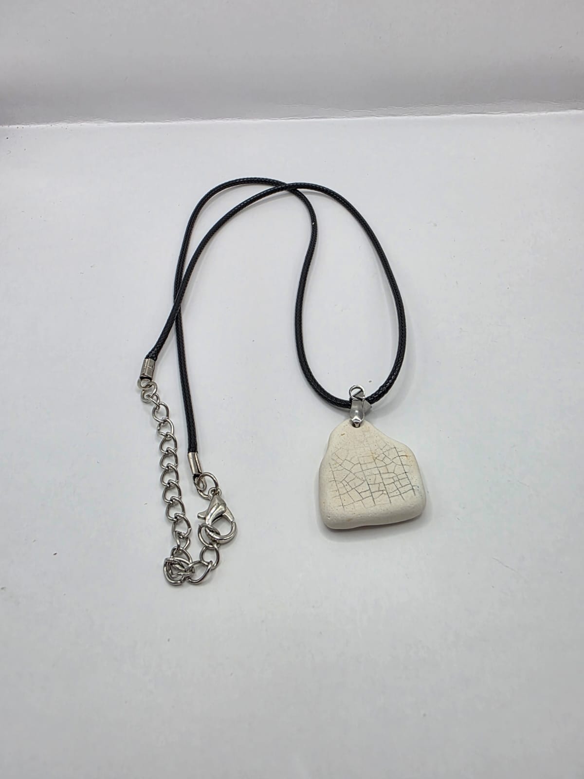 Sea pottery pendant necklace on a black waxed cord adjustable necklace