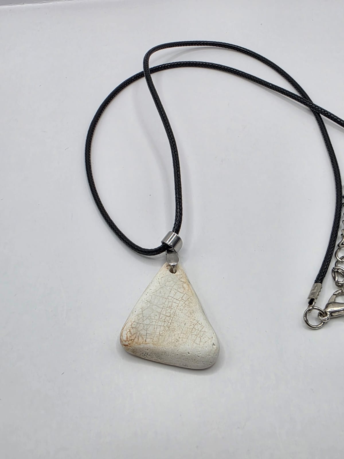Sea pottery pendant necklace on a black waxed cord adjustable necklace
