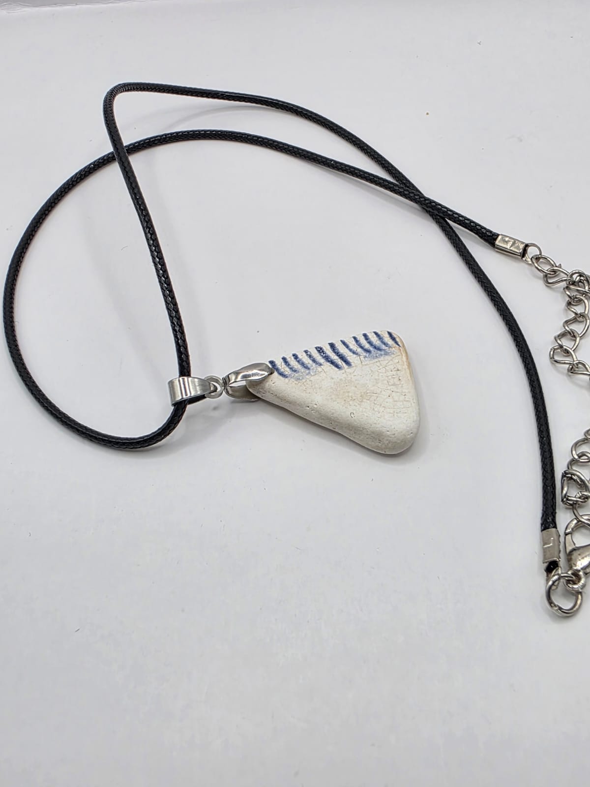 Sea pottery pendant necklace on a black waxed cord adjustable necklace