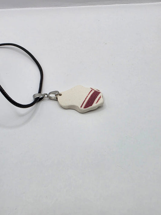 Sea pottery pendant necklace on a black waxed cord adjustable necklace