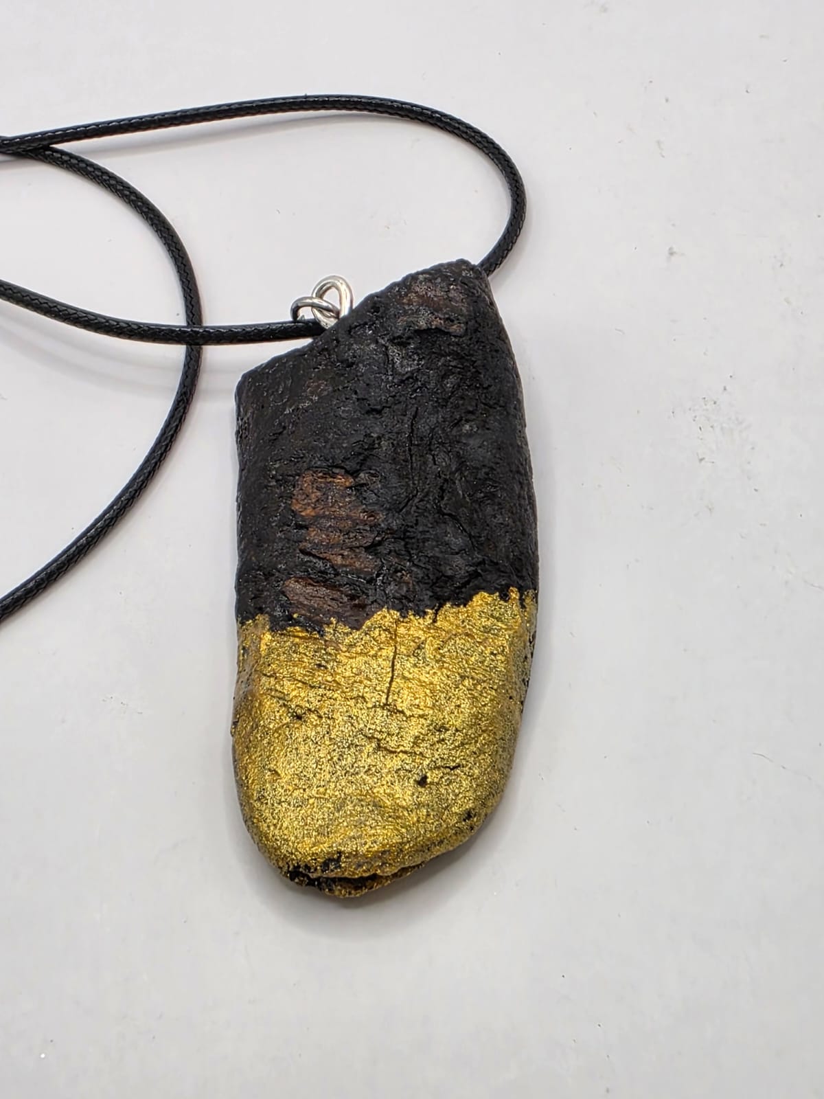 Driftwood pendant necklace featuring metallic painted style design