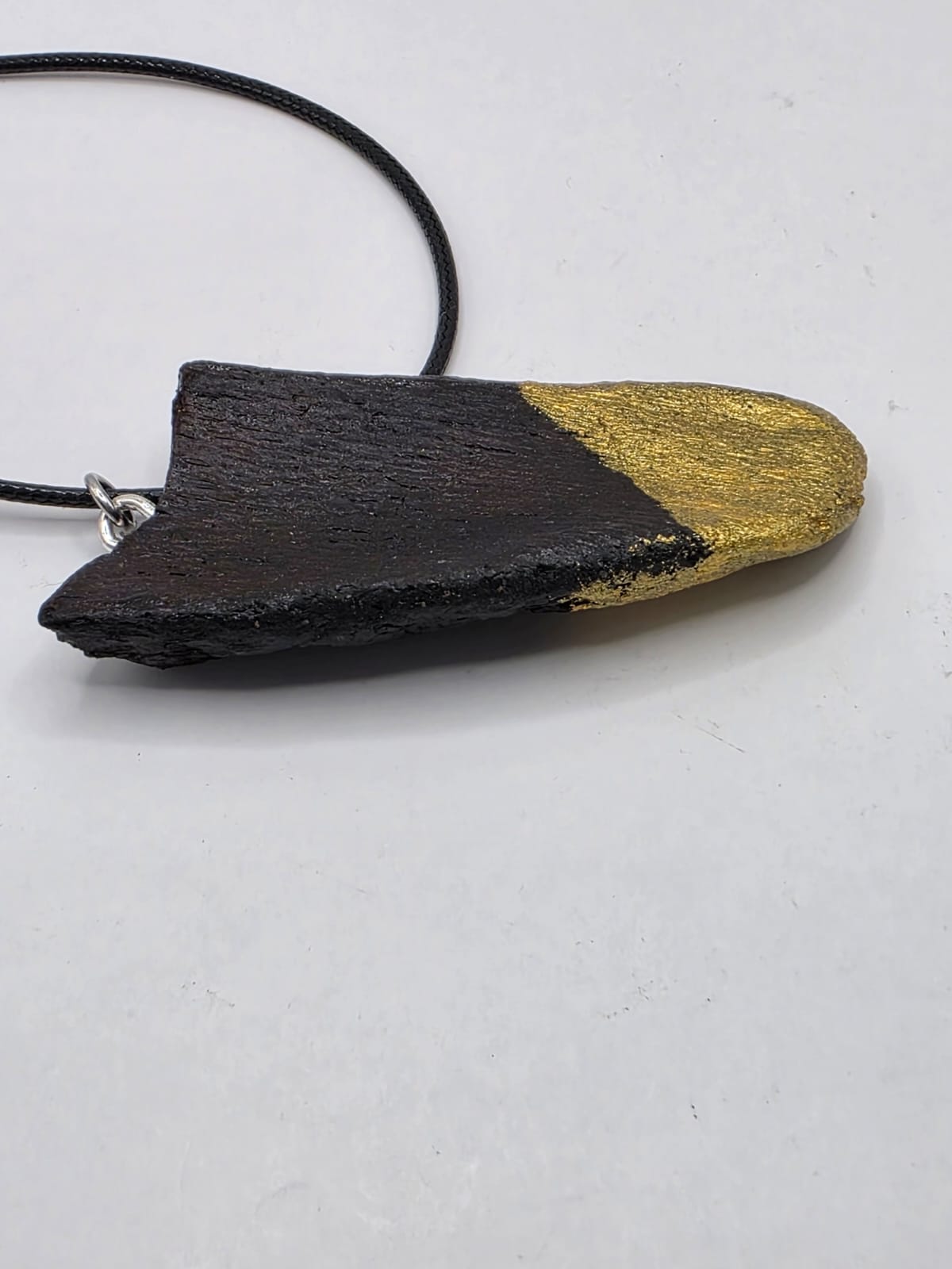 Driftwood pendant necklace featuring metallic painted style design