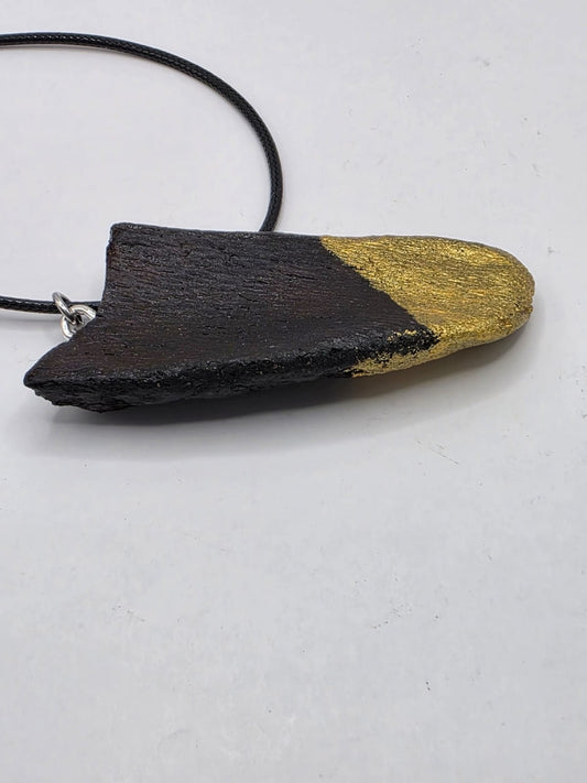 Driftwood pendant necklace featuring metallic painted style design
