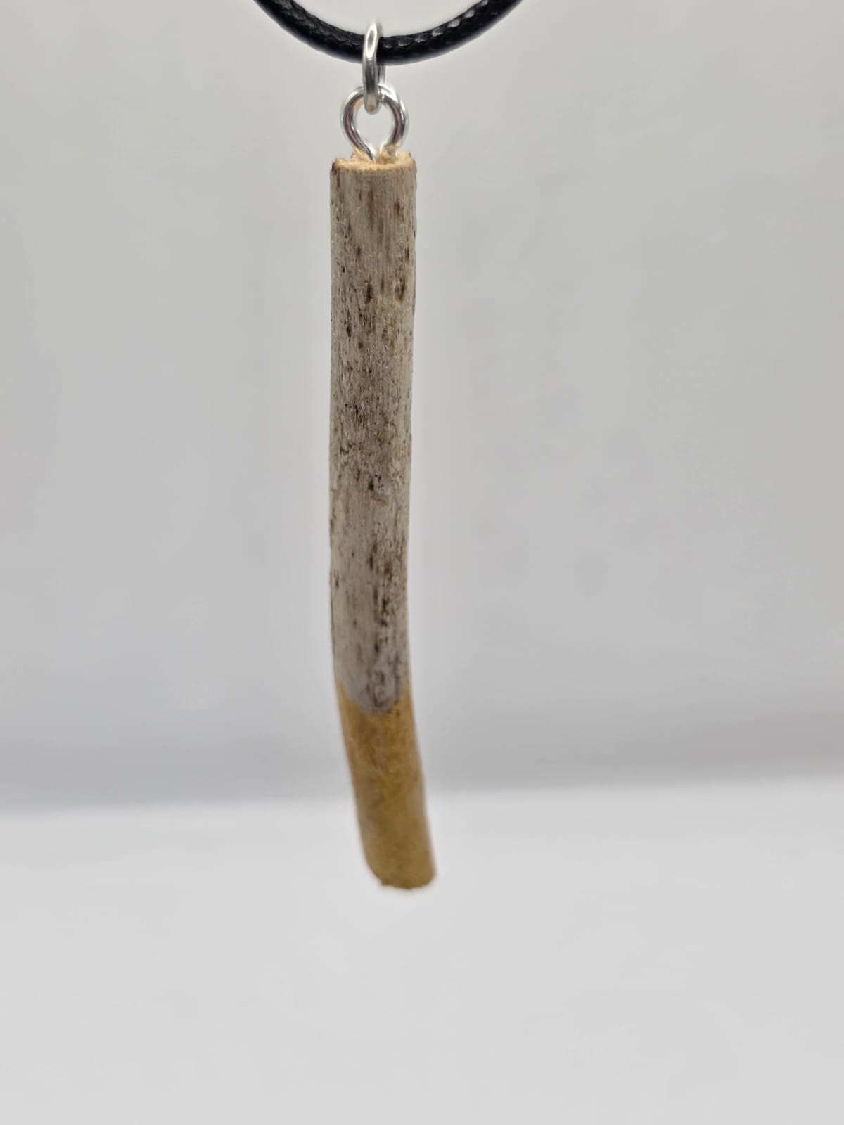 Driftwood pendant necklace featuring metallic painted style design