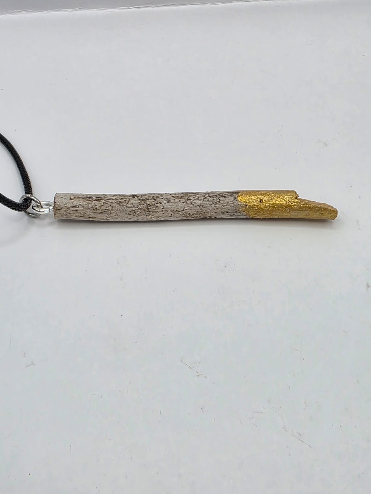Driftwood pendant necklace featuring metallic painted style design
