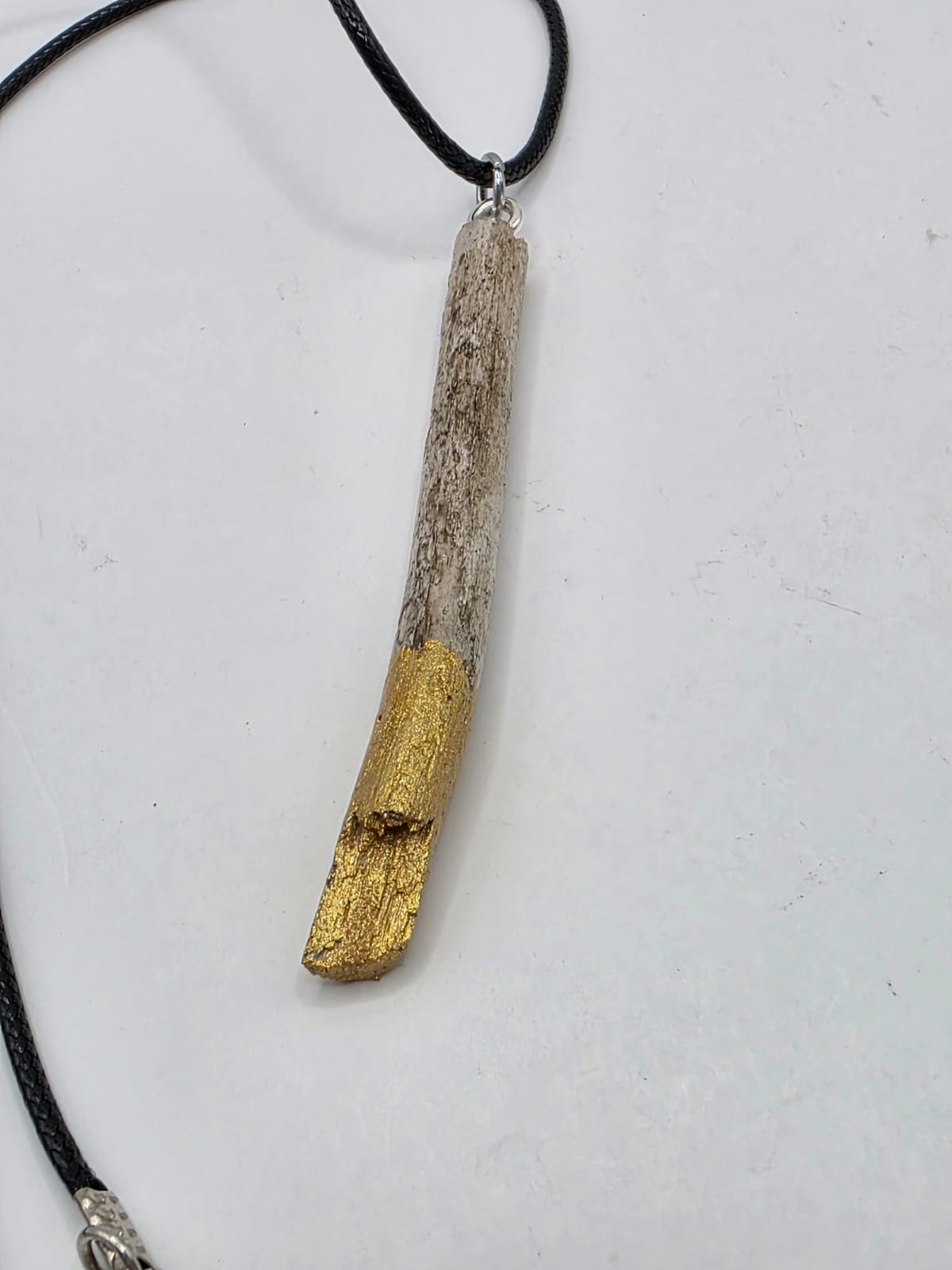 Driftwood pendant necklace featuring metallic painted style design