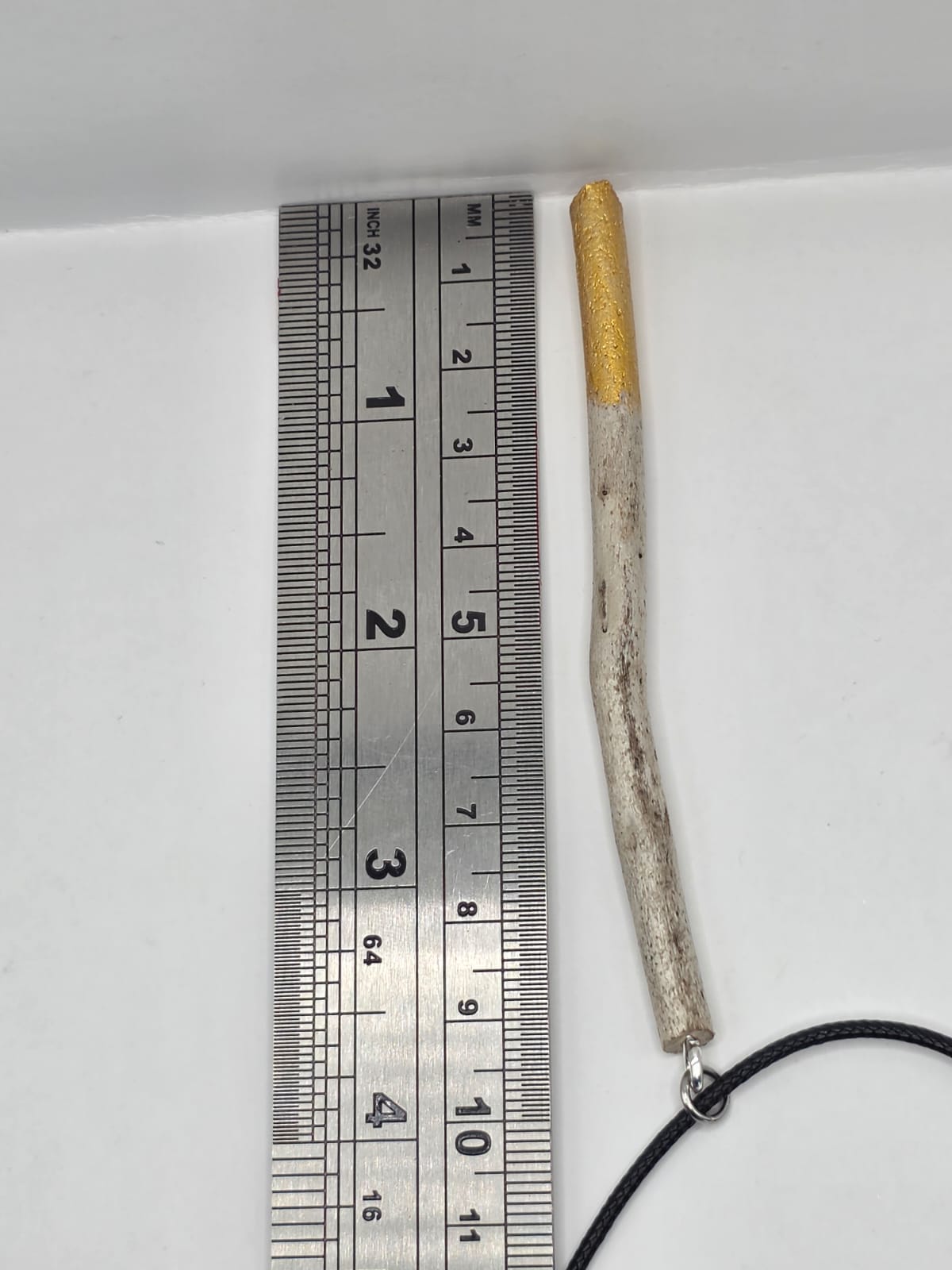 Driftwood pendant necklace featuring metallic painted style design