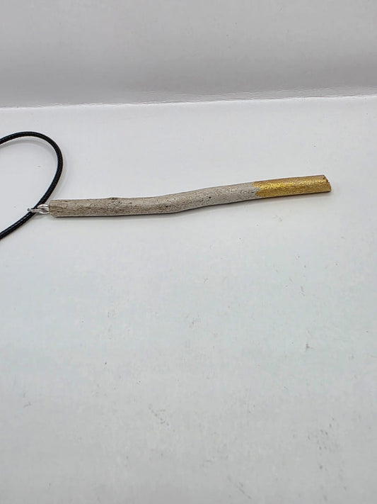 Driftwood pendant necklace featuring metallic painted style design