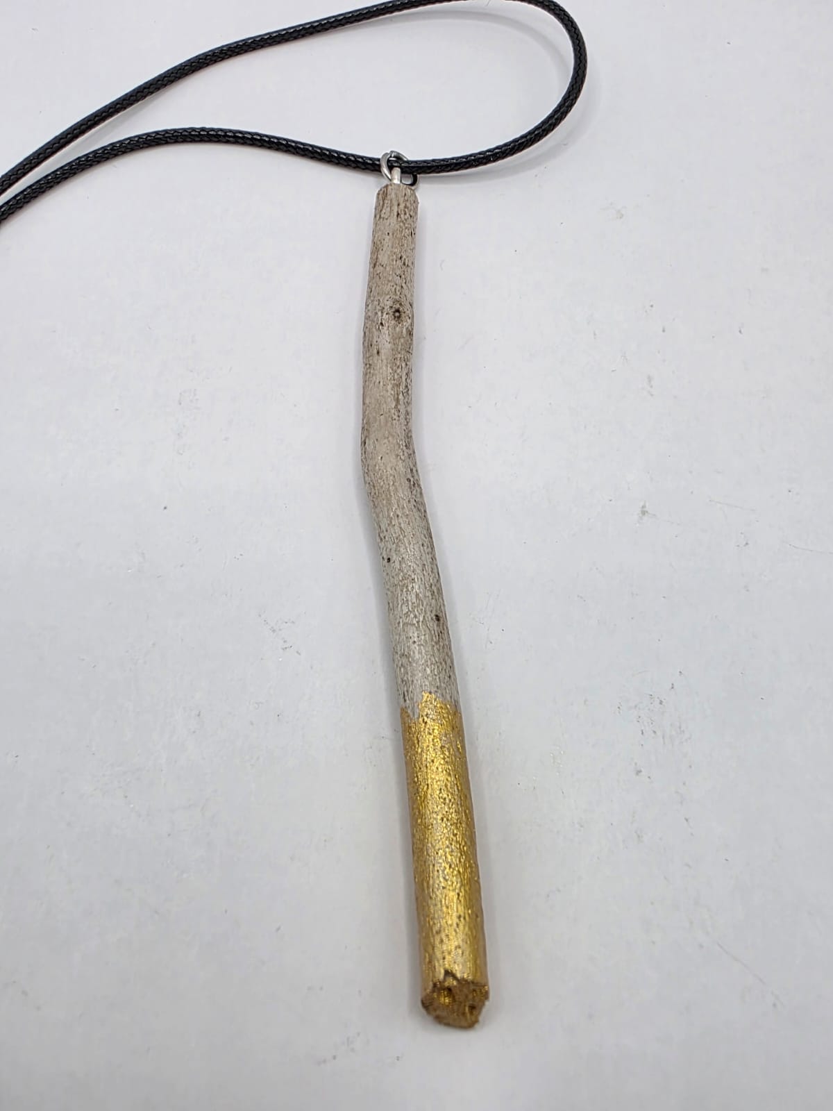 Driftwood pendant necklace featuring metallic painted style design