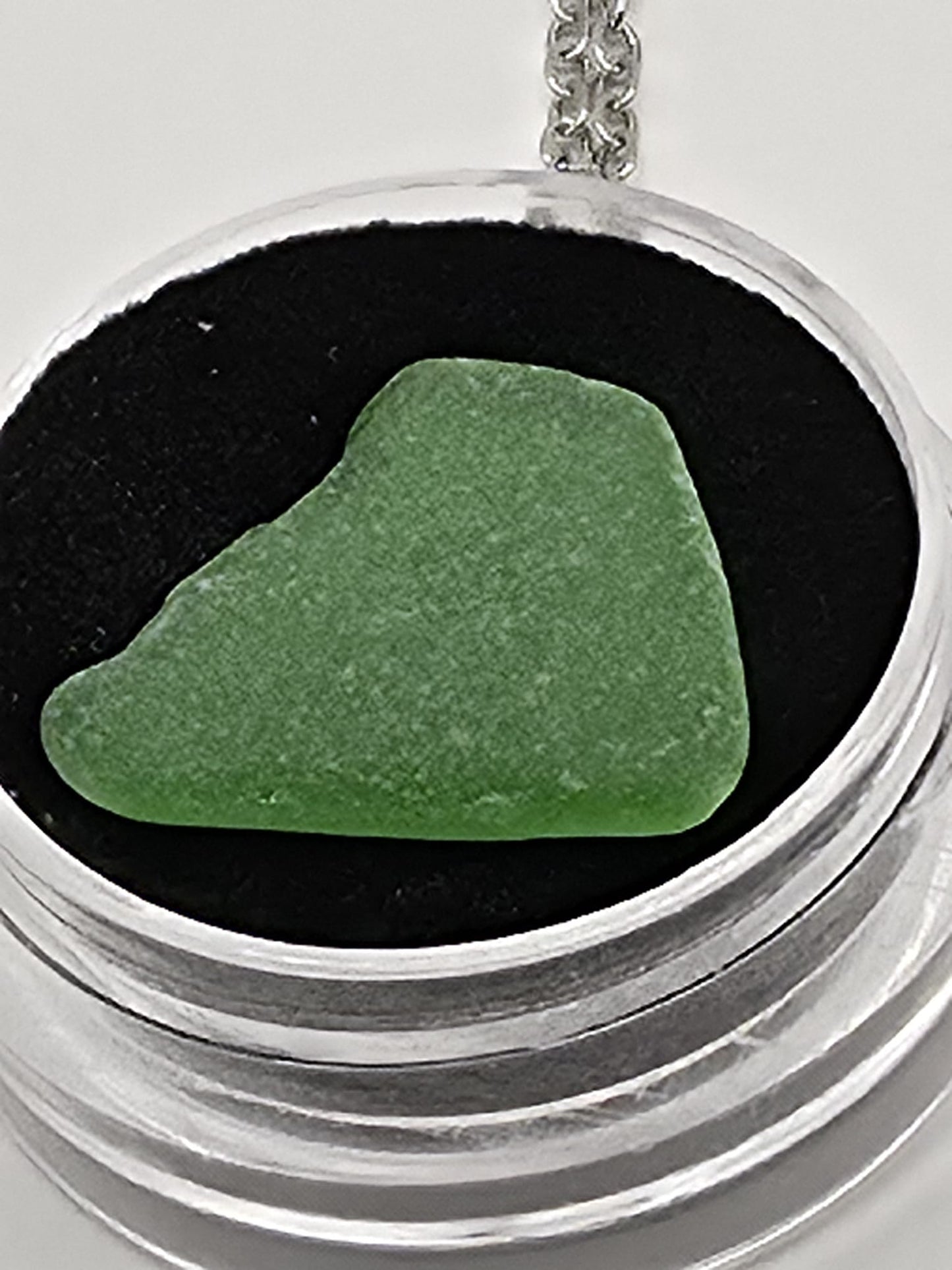Sea Glass in a display case which can be opened as a pendant necklace on a stainless steel chain (Copy)