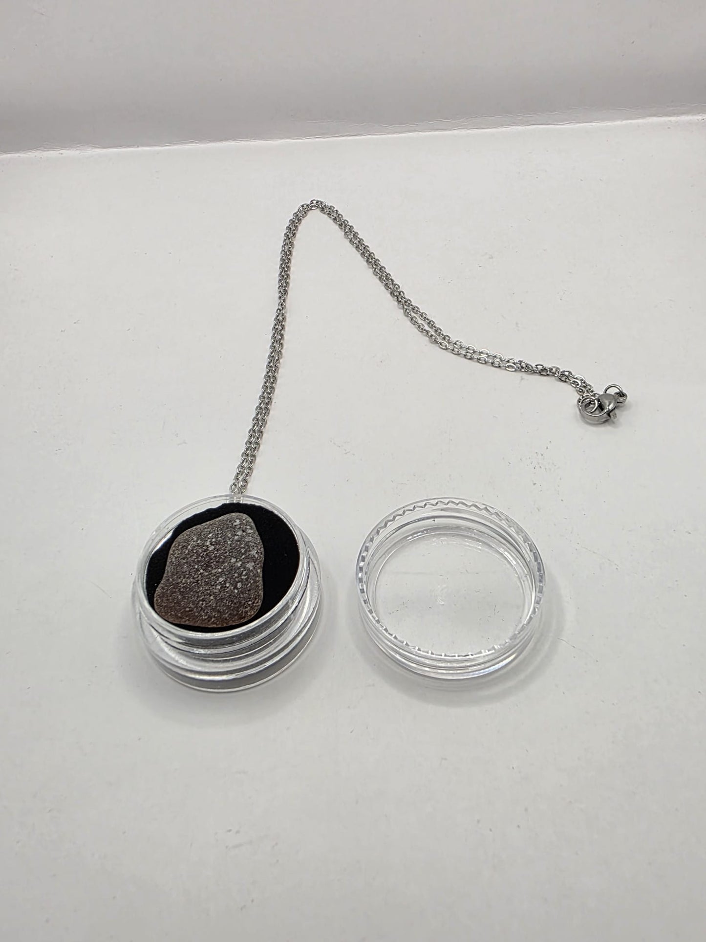 Sea Glass in a display case which can be opened as a pendant necklace on a stainless steel chain (Copy) (Copy)