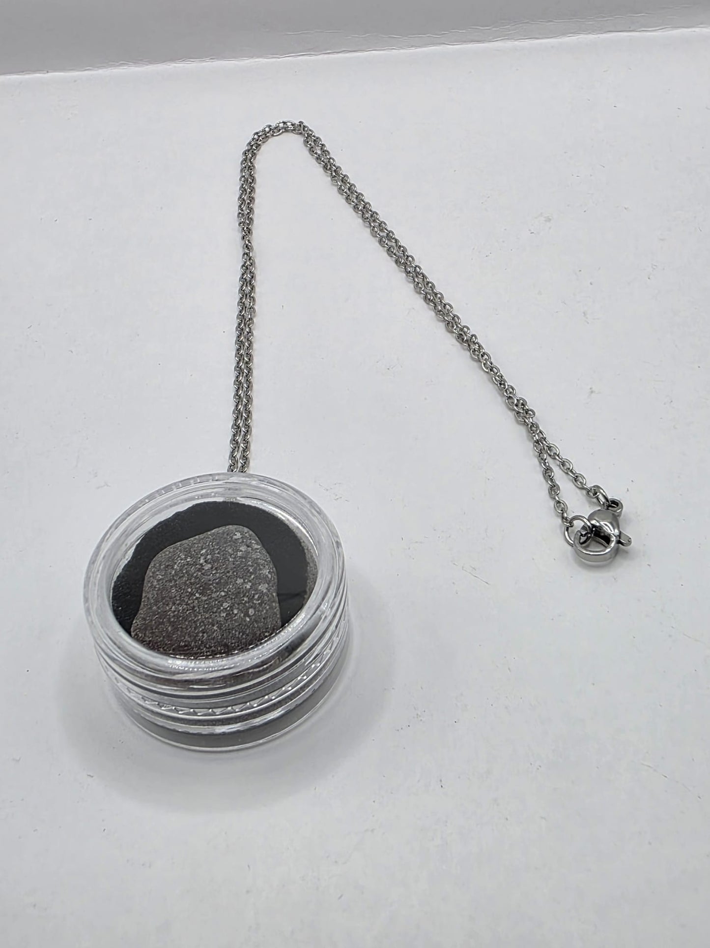 Sea Glass in a display case which can be opened as a pendant necklace on a stainless steel chain (Copy) (Copy)