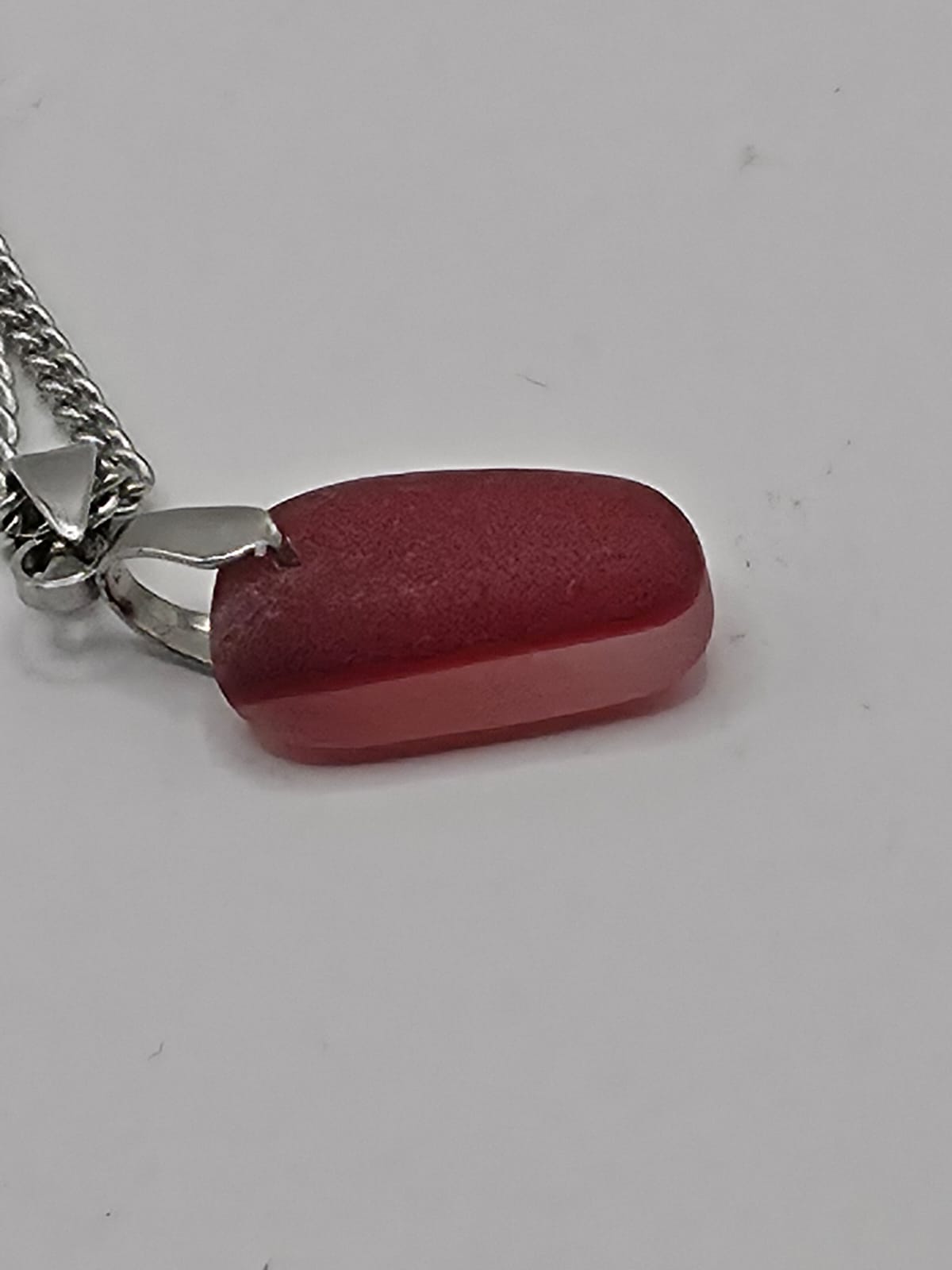 Genuine Multi Red Sea Glass Pendant Necklace on a stainless steel chain. Each piece is a one-of-a-kind