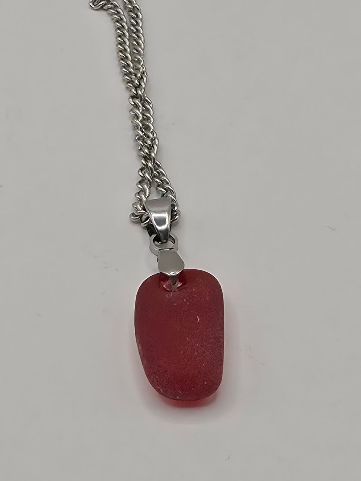 Genuine Multi Red Sea Glass Pendant Necklace on a stainless steel chain. Each piece is a one-of-a-kind