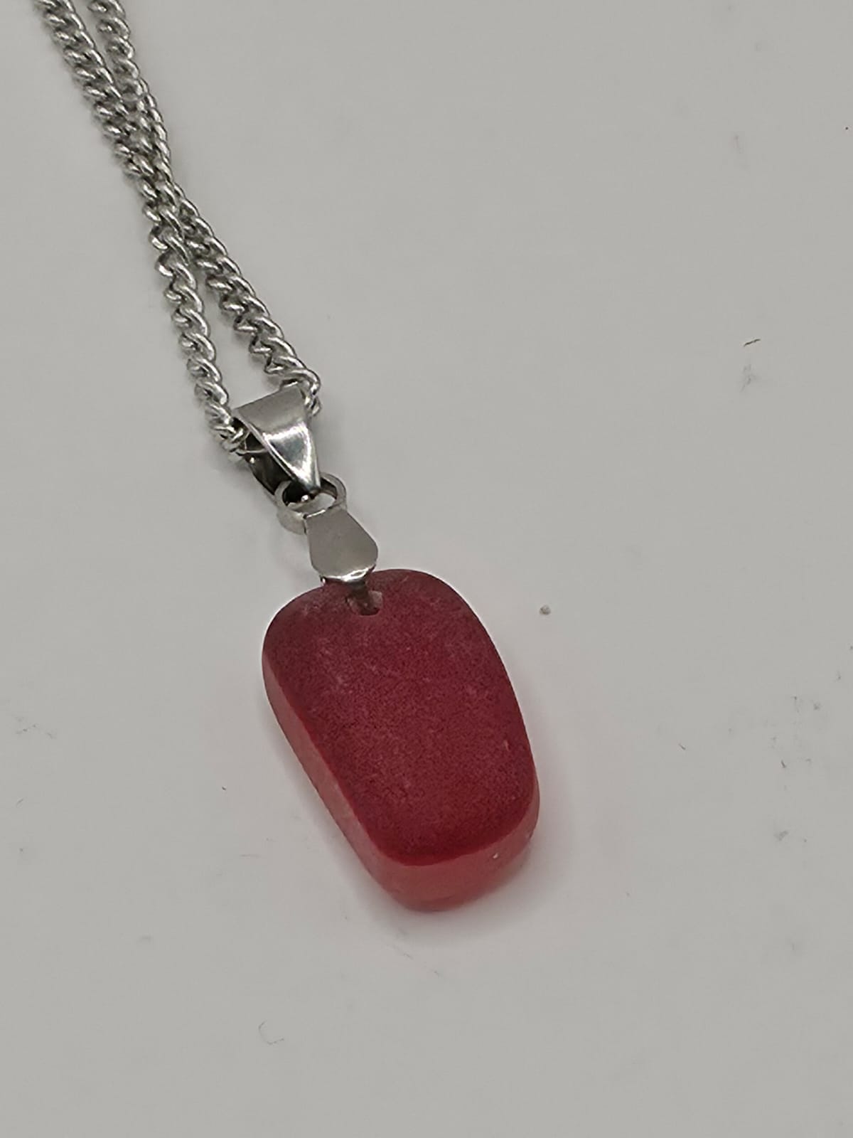 Genuine Multi Red Sea Glass Pendant Necklace on a stainless steel chain. Each piece is a one-of-a-kind