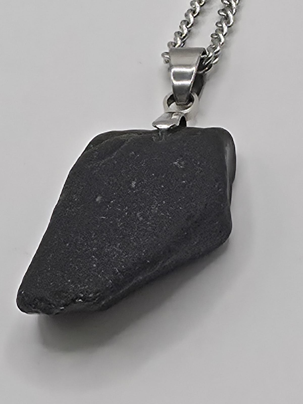 Genuine Black Sea Glass Pendant Necklace on stainless steel chain. Each piece is a one-of-a-kind
