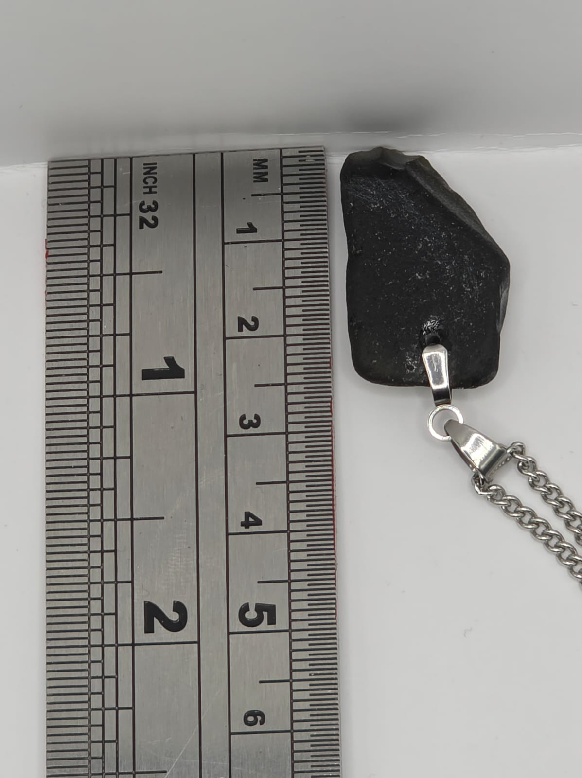 Genuine Black Sea Glass Pendant Necklace on stainless steel chain. Each piece is a one-of-a-kind