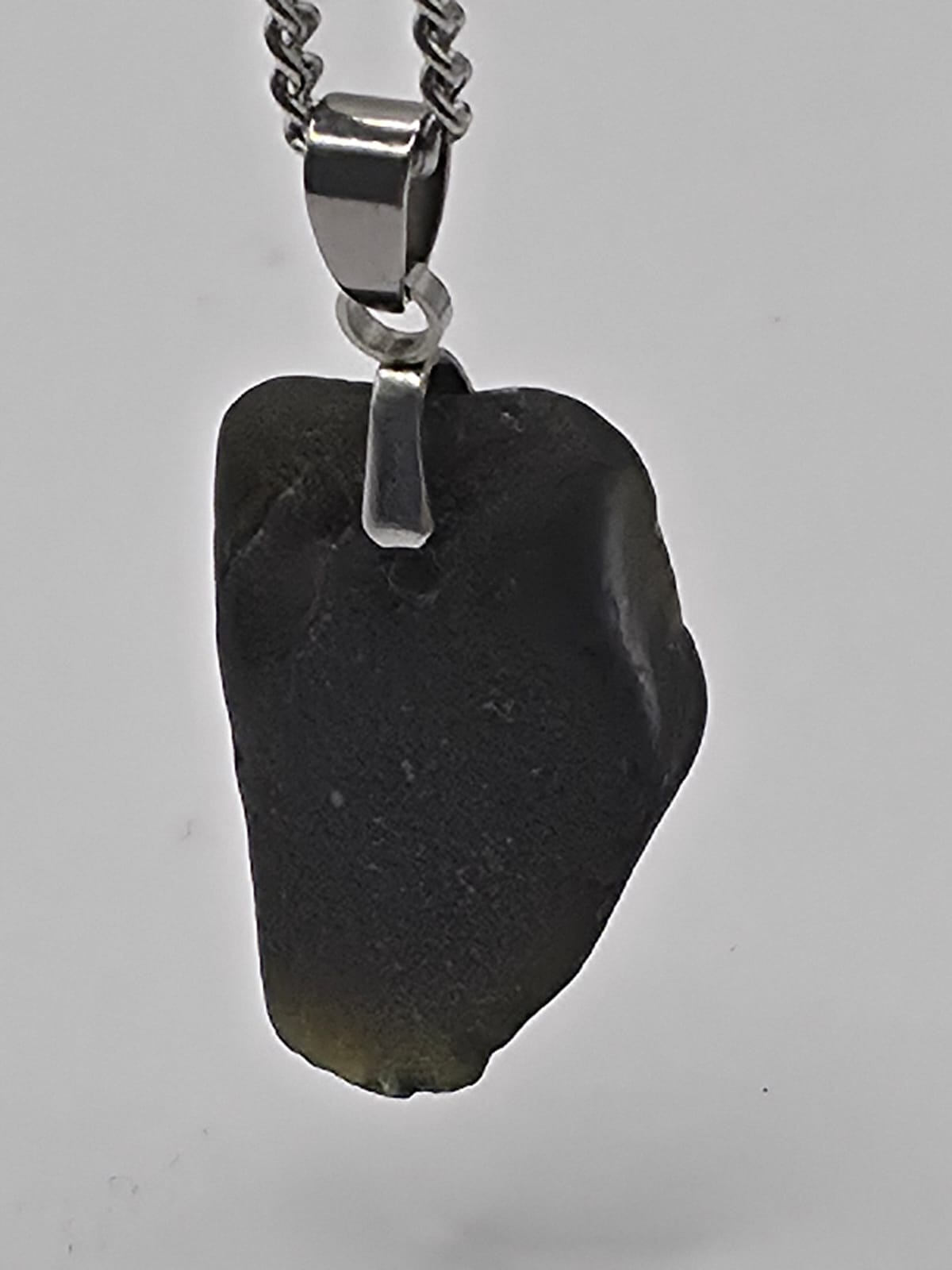 Genuine Black Sea Glass Pendant Necklace on stainless steel chain. Each piece is a one-of-a-kind