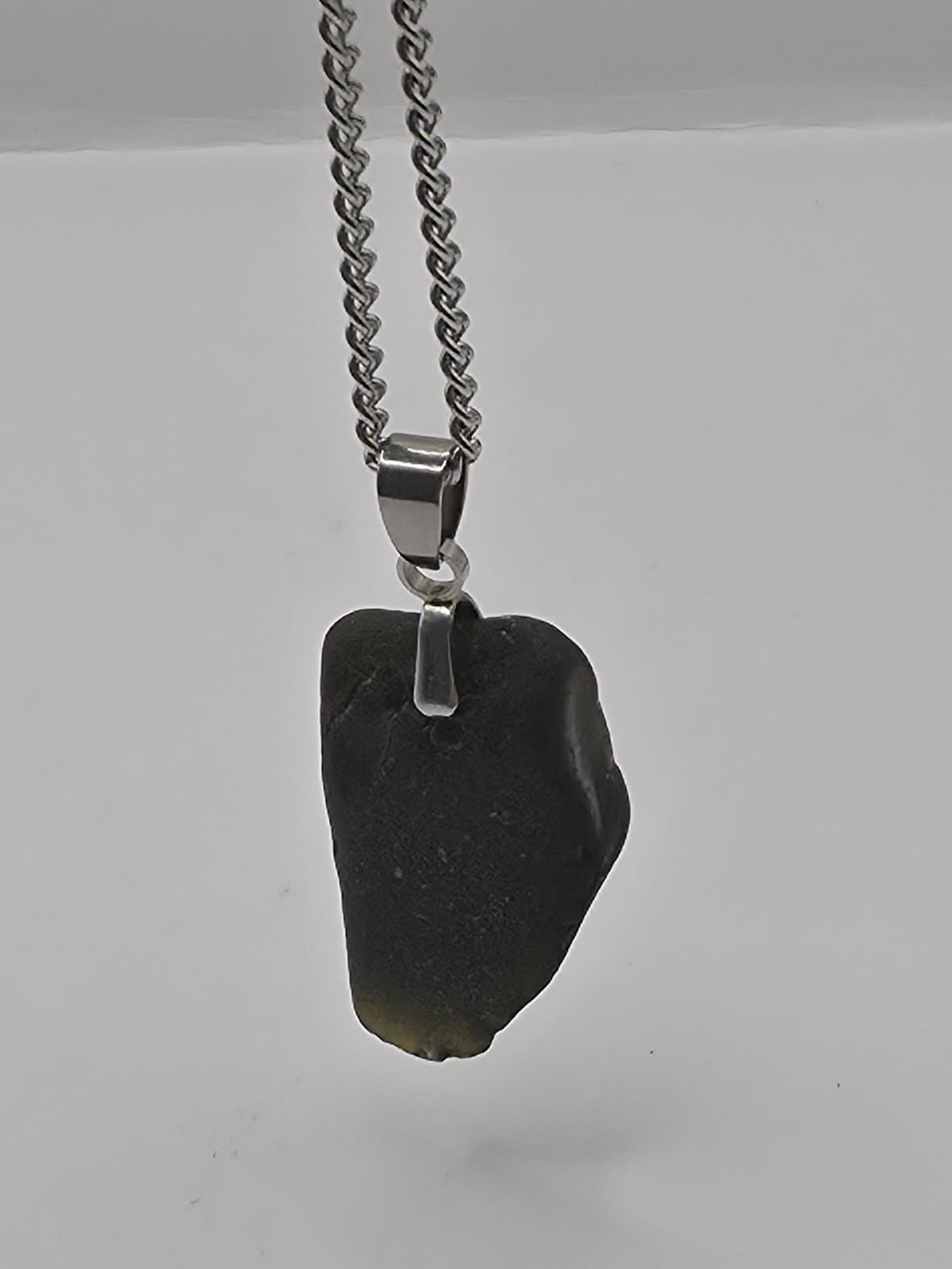 Genuine Black Sea Glass Pendant Necklace on stainless steel chain. Each piece is a one-of-a-kind