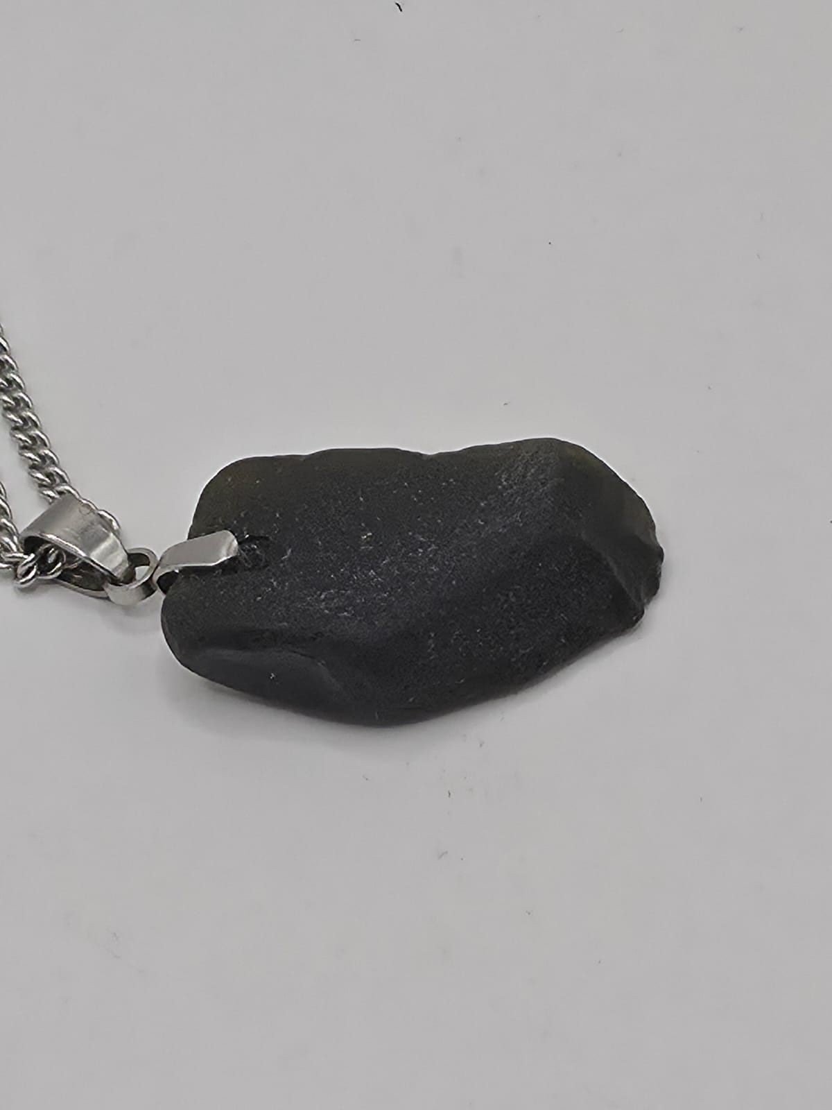 Genuine Black Sea Glass Pendant Necklace on stainless steel chain. Each piece is a one-of-a-kind