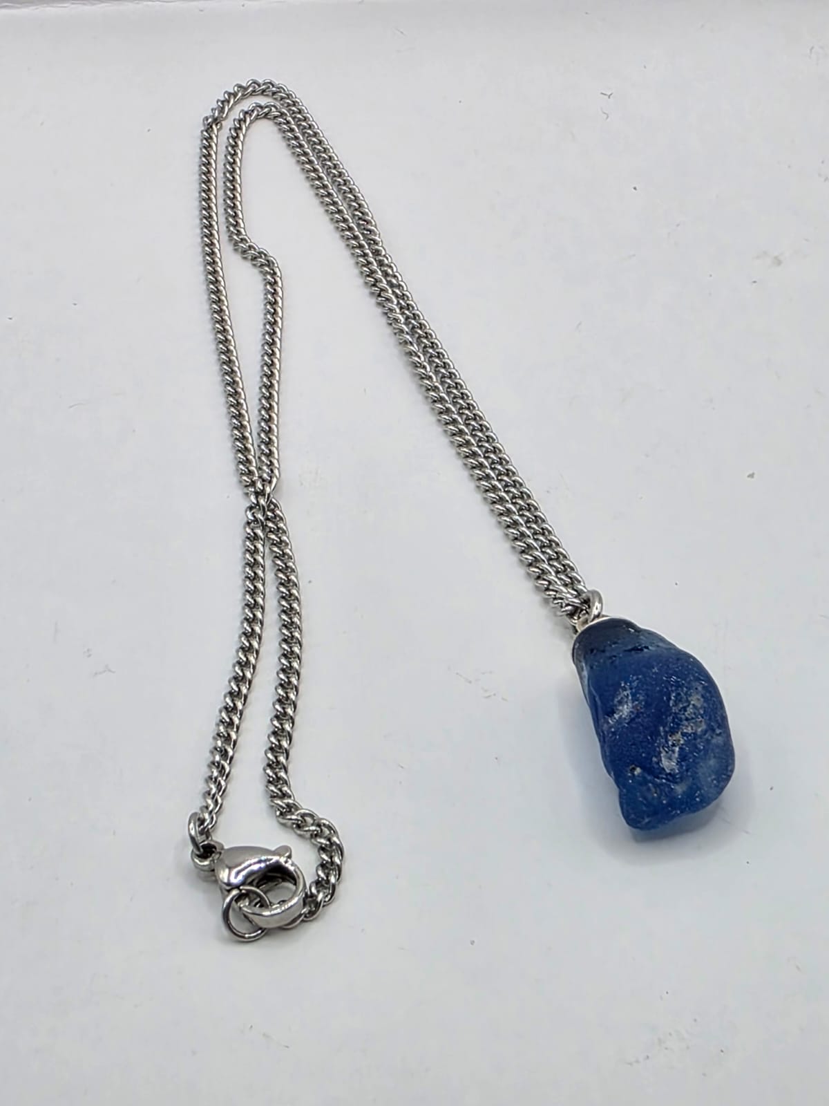 Genuine Blue Sea Glass Pendant Necklace on stainless steel chain. Each piece is a one-of-a-kind