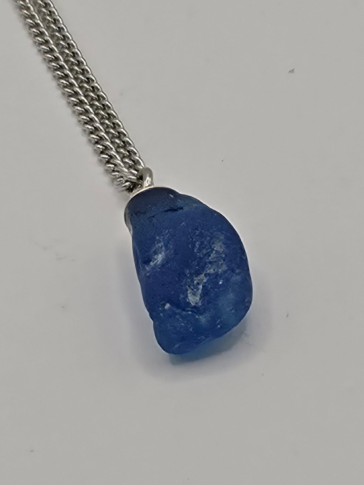 Genuine Blue Sea Glass Pendant Necklace on stainless steel chain. Each piece is a one-of-a-kind