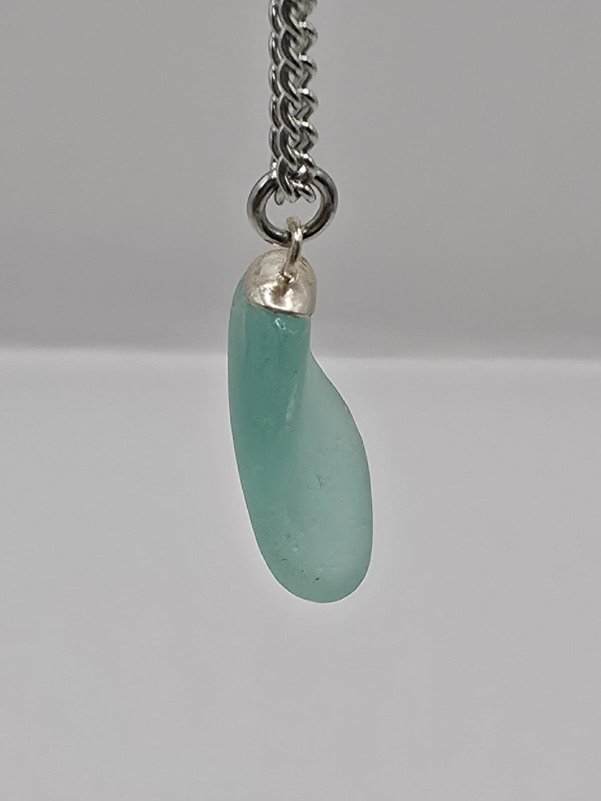 Genuine Aqua Blue Sea Glass Pendant Necklace on stainless steel chain. Each piece is a one-of-a-kind