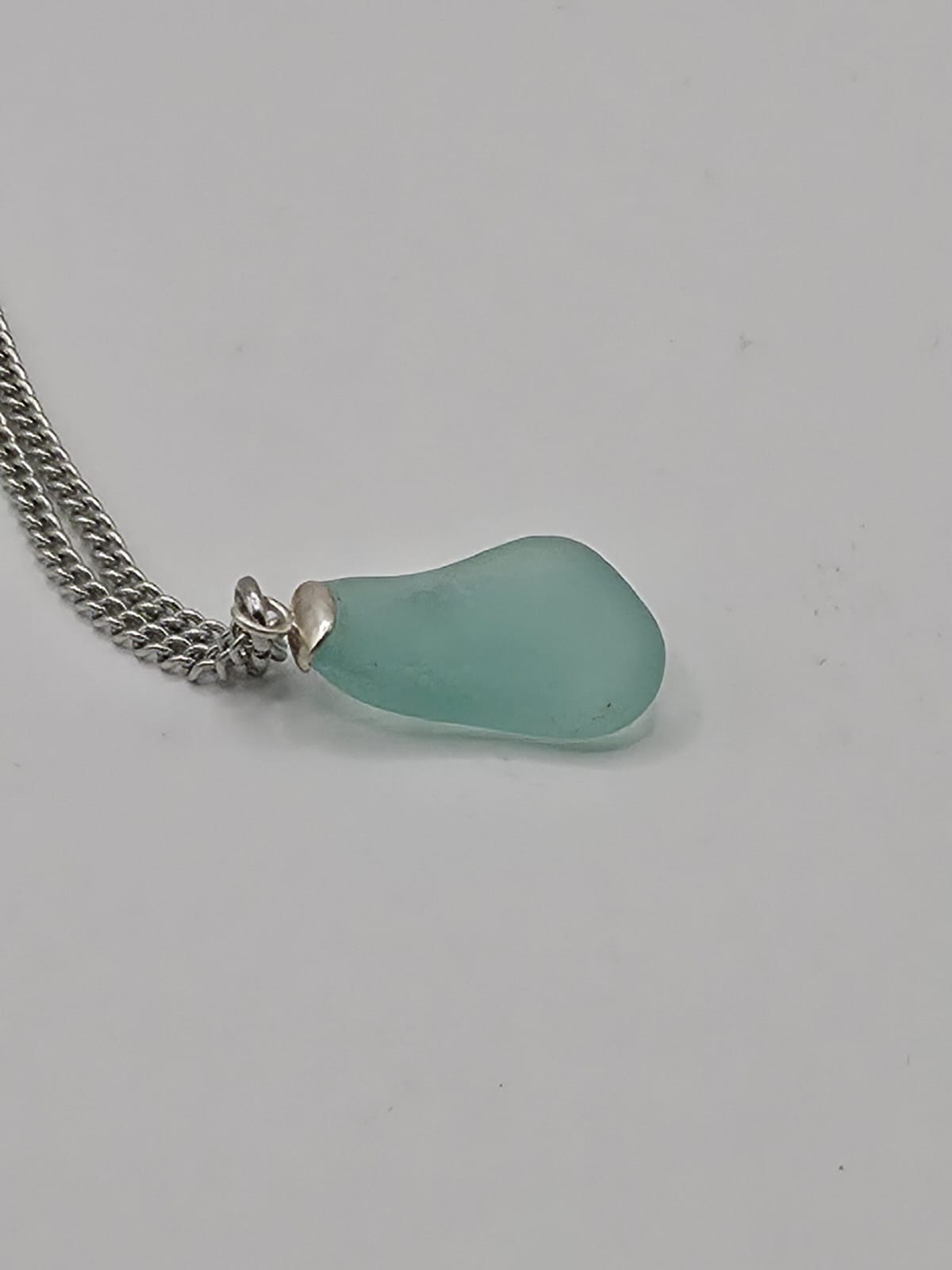 Genuine Aqua Blue Sea Glass Pendant Necklace on stainless steel chain. Each piece is a one-of-a-kind