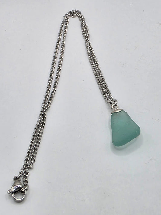Genuine Aqua Blue Sea Glass Pendant Necklace on stainless steel chain. Each piece is a one-of-a-kind